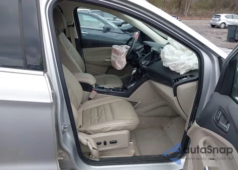 2016 Ford Escape Titanium z USA, uszkodzony, nr VIN 1FMCU0J96GUC19106